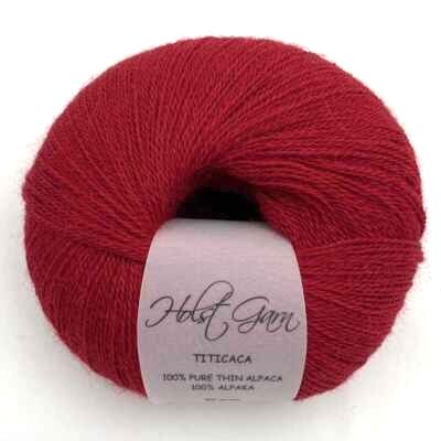 Holst Garn Titicaca Yarn is a Lace Weigh Plump Fluffy Alpaca with Soft Halo Ideal for Mohair Replacement in many colors like Pink Green Red Gray Blue Beige White Purple Brown