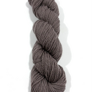 A single skein of twisted yarn in a muted taupe-brown color, photographed vertically against a clean white background.