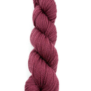 A single twisted skein of yarn in a deep burgundy or plum shade, centered on a plain white background.