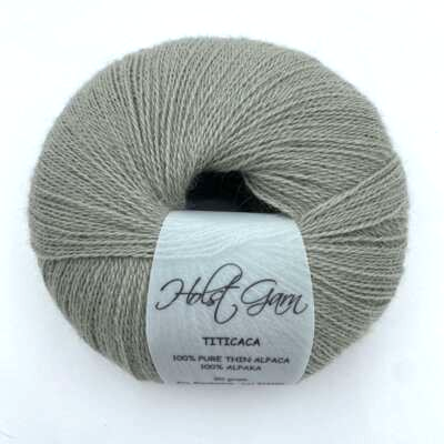 Holst Garn Titicaca Yarn is a Lace Weigh Plump Fluffy Alpaca with Soft Halo Ideal for Mohair Replacement in many colors like Pink Green Red Gray Blue Beige White Purple Brown