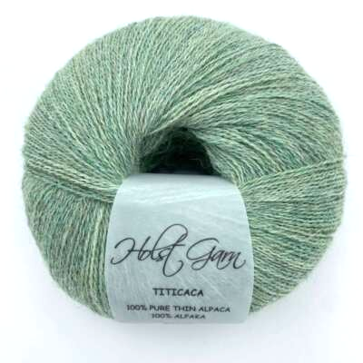 Holst Garn Titicaca Yarn is a Lace Weigh Plump Fluffy Alpaca with Soft Halo Ideal for Mohair Replacement in many colors like Pink Green Red Gray Blue Beige White Purple Brown