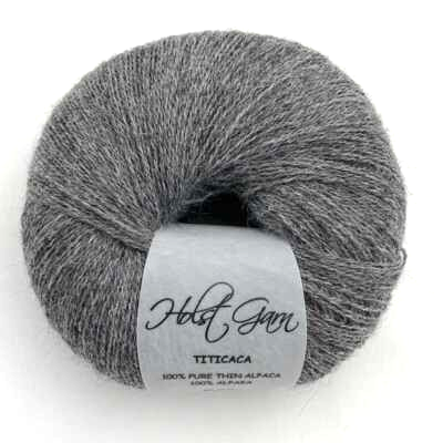 Holst Garn Titicaca Yarn is a Lace Weigh Plump Fluffy Alpaca with Soft Halo Ideal for Mohair Replacement in many colors like Pink Green Red Gray Blue Beige White Purple Brown