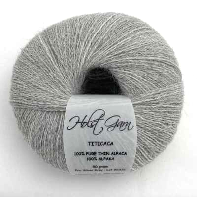 Holst Garn Titicaca Yarn is a Lace Weigh Plump Fluffy Alpaca with Soft Halo Ideal for Mohair Replacement in many colors like Pink Green Red Gray Blue Beige White Purple Brown