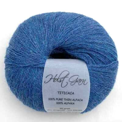 Holst Garn Titicaca Yarn is a Lace Weigh Plump Fluffy Alpaca with Soft Halo Ideal for Mohair Replacement in many colors like Pink Green Red Gray Blue Beige White Purple Brown
