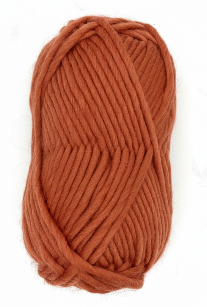 Bulky Weight Yarn 100% Merino Wool Super Bulky Yarn Weight 6 Chunky Natural Wool Yarn for Knitting & Crochet Quick Project Yarn. A skein of chunky orange-brown yarn wrapped with a label reading 'World of Wool Chubbs' on a light marble surface.