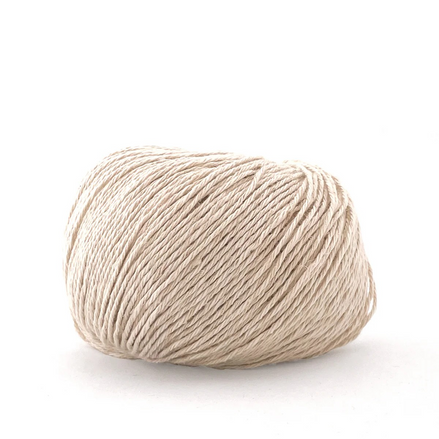 A ball of light beige yarn on a clean white background.