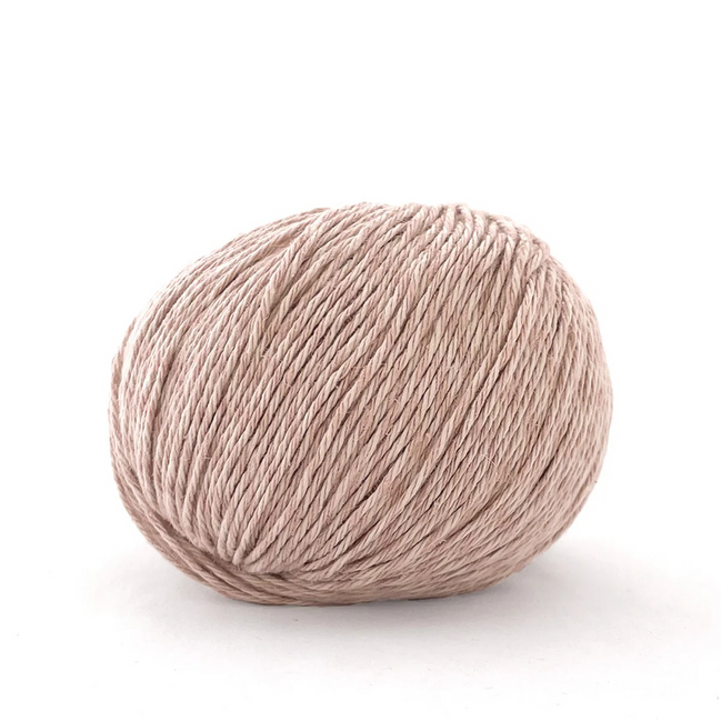 Ball of pink yarn on a white background