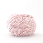 A ball of light pink yarn photographed on a clean white background.