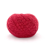 Red skein of yarn on a white background