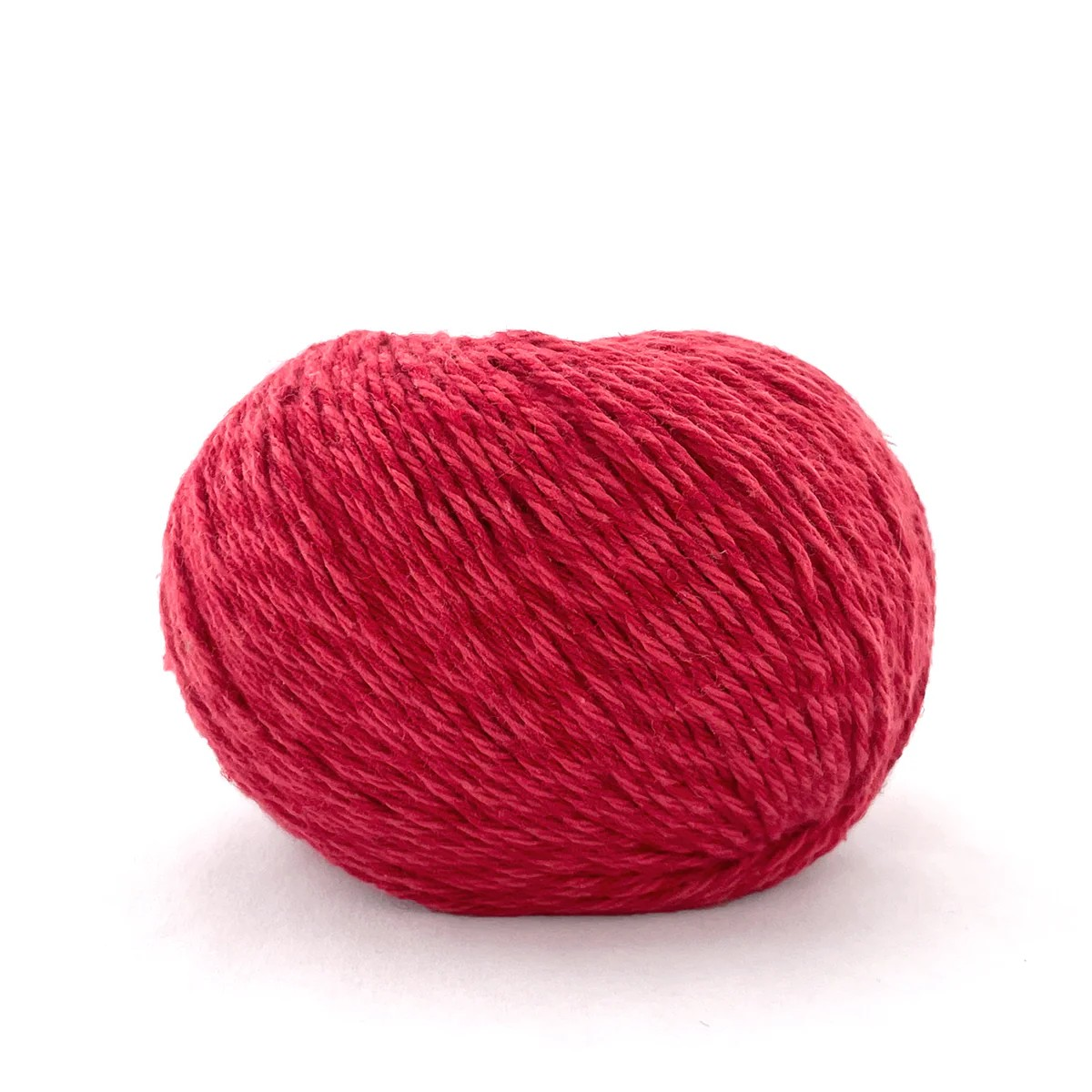 Red skein of yarn on a white background