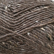 Close-up of brown yarn with visible fibers