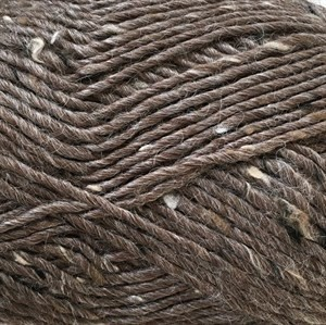 Close-up of brown yarn with visible fibers