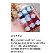 A product review with a small photo of several skeins of yarn in a copper wire basket, accompanied by five stars and a customer review text praising the softness, color, and packaging of the mohair wool yarn. 