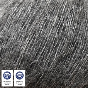 A close-up of dark gray to black synthetic fiber mesh or felt material with fine strands, showing texture and weave. Two small certification-style logos appear in the lower left corner.