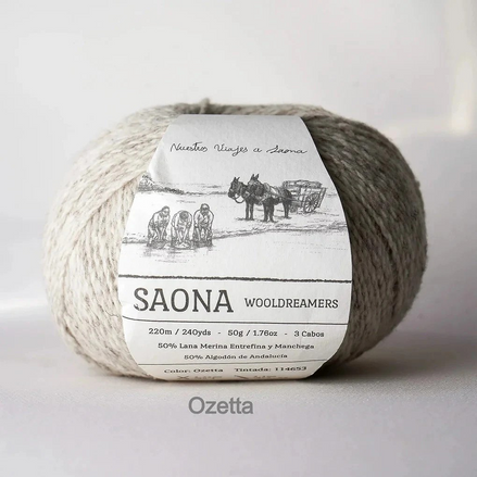 A ball of wool yarn with a white paper label reading 'SAONA WOODREAMERS' and 'Ozetta' at the bottom, photographed against a plain light background.