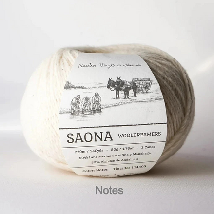 A ball of wool yarn with a paper label reading 'SAONA WOODREAMERS' and 'Notes' printed below, photographed on a clean white background.