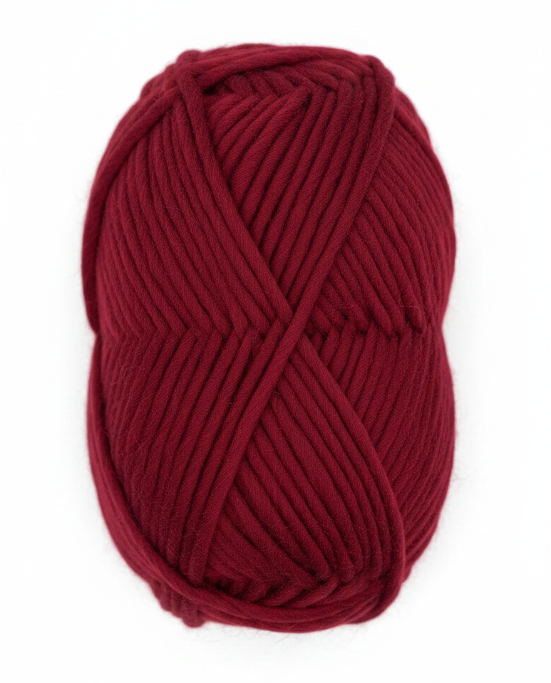 Bulky Weight Yarn 100% Merino Wool Super Bulky Yarn Weight 6 Chunky Natural Wool Yarn for Knitting & Crochet Quick Project Yarn. A skein of chunky merino wool yarn in deep burgundy red, wrapped with a white paper label that reads 'World of Wool Chubbs'. The yarn is photographed on a light, white marble surface.