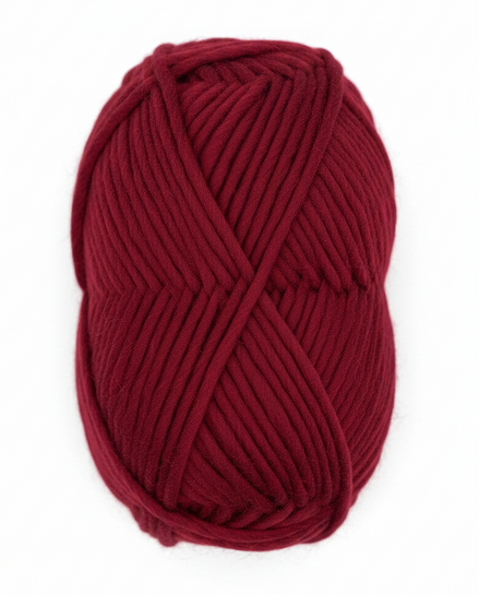 Bulky Weight Yarn 100% Merino Wool Super Bulky Yarn Weight 6 Chunky Natural Wool Yarn for Knitting & Crochet Quick Project Yarn. A skein of chunky merino wool yarn in deep burgundy red, wrapped with a white paper label that reads 'World of Wool Chubbs'. The yarn is photographed on a light, white marble surface.