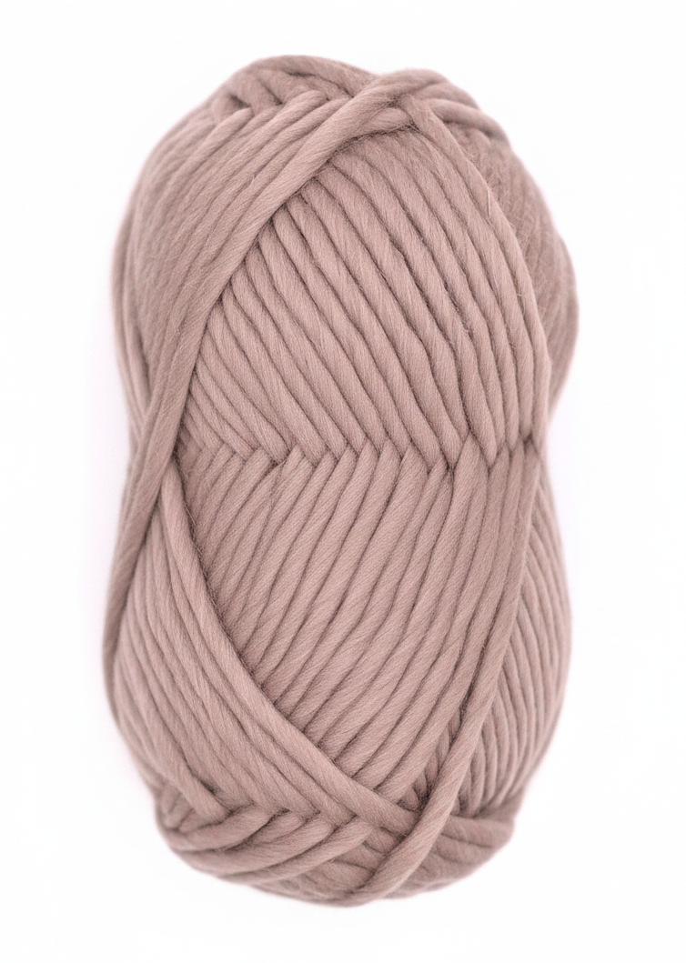 Bulky Weight Yarn 100% Merino Wool Super Bulky Yarn Weight 6 Chunky Natural Wool Yarn for Knitting & Crochet Quick Project Yarn. A skein of chunky wool yarn in a dusty mauve-pink color, wrapped with a red and white paper label that reads 'World of Wool Chubbs Super Chunky 100% Merino Yarn'. The yarn is photographed on a white marble surface.