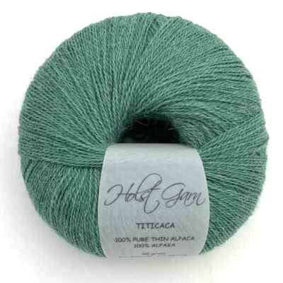 Holst Garn Titicaca Yarn is a Lace Weigh Plump Fluffy Alpaca with Soft Halo Ideal for Mohair Replacement in many colors like Pink Green Red Gray Blue Beige White Purple Brown