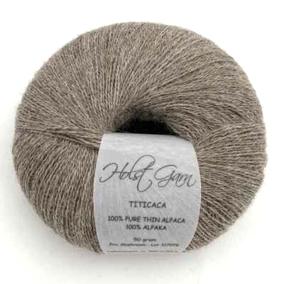 Holst Garn Titicaca Yarn is a Lace Weigh Plump Fluffy Alpaca with Soft Halo Ideal for Mohair Replacement in many colors like Pink Green Red Gray Blue Beige White Purple Brown