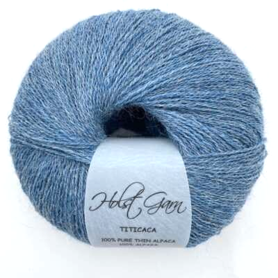 Holst Garn Titicaca Yarn is a Lace Weigh Plump Fluffy Alpaca with Soft Halo Ideal for Mohair Replacement in many colors like Pink Green Red Gray Blue Beige White Purple Brown