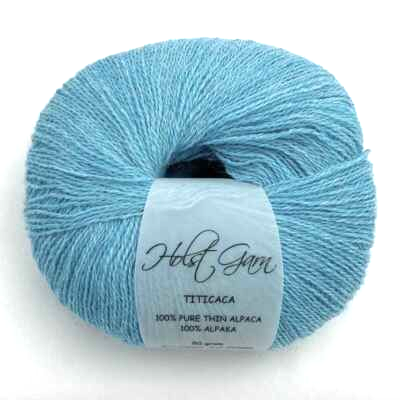 Holst Garn Titicaca Yarn is a Lace Weigh Plump Fluffy Alpaca with Soft Halo Ideal for Mohair Replacement in many colors like Pink Green Red Gray Blue Beige White Purple Brown